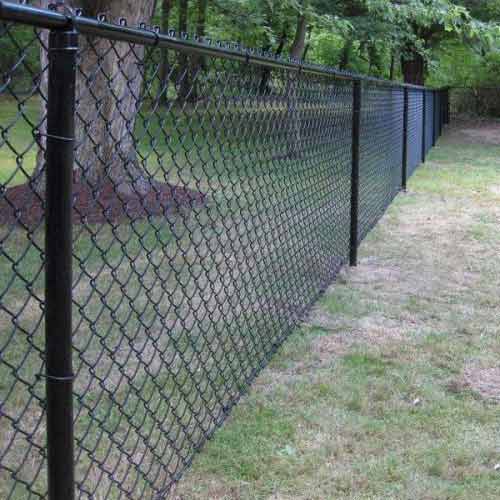 Chain Link Fence vs. Wood Fence: Which Fits Your Property’s Aesthetic & Function?